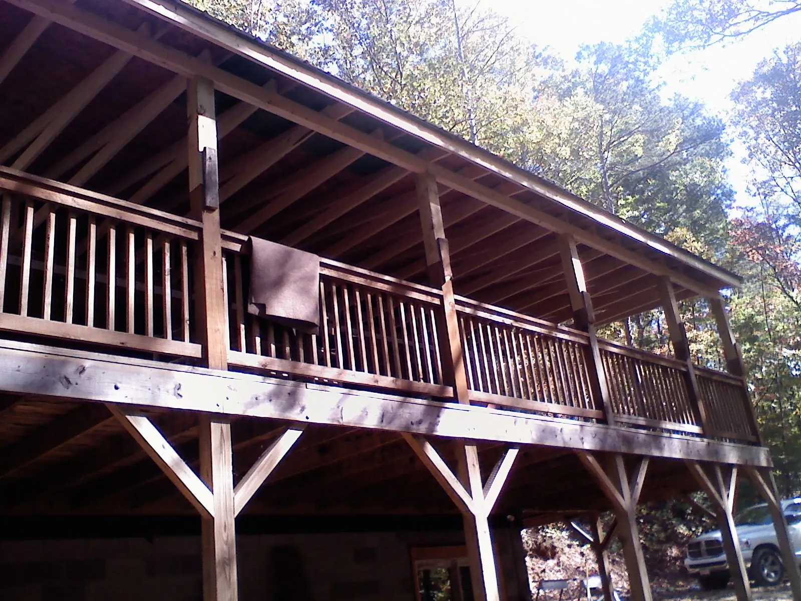 Timber framing under a new elevated porch and deck — Roof Leak Repair in Muscotah by Roofing Brothers